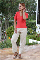 RANT & RAVE LADIES Betsy Coral V Neck Top Coral model front view