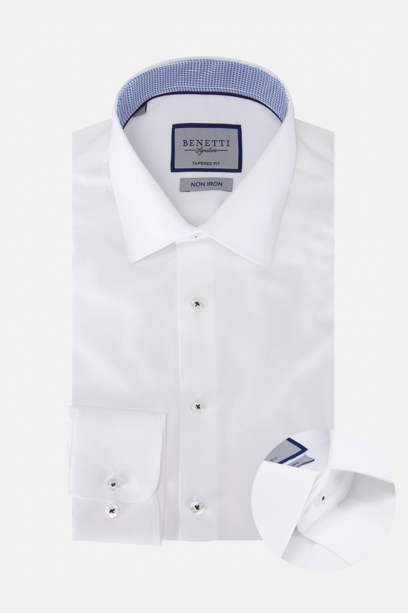 White dress shirt with blue collar and cuffs on a white background