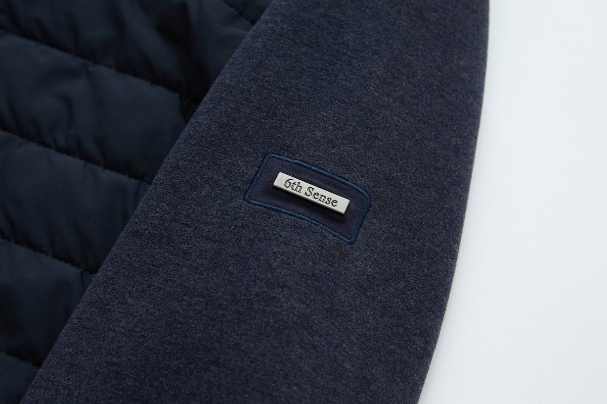 6th Sense Cloud Hybrid Full Zip Navy Jacket sleeve logo patch reading 6th Sense on navy fabric