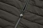 6th Sense Cloud Hybrid Full Zip Peat Jacket zipper detail featuring a circular pull tab with a logo on the quilted peat fabric.