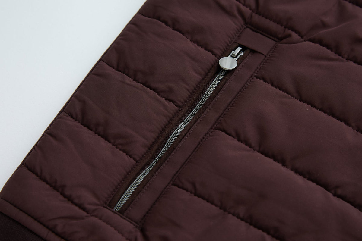 Side zip pocket on the 6th Sense Cloud Hybrid Full Zip Plum Jacket