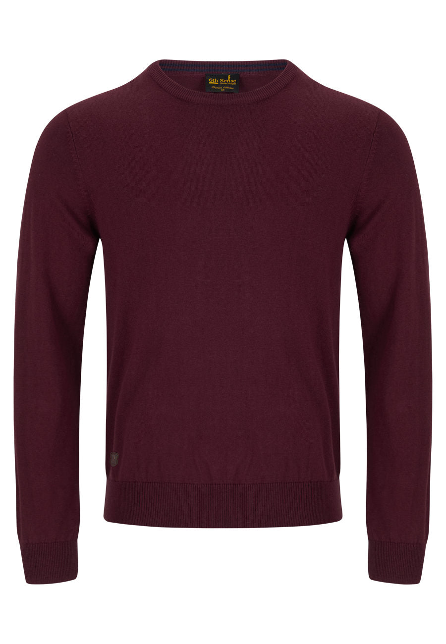 Maroon sweater on a white background