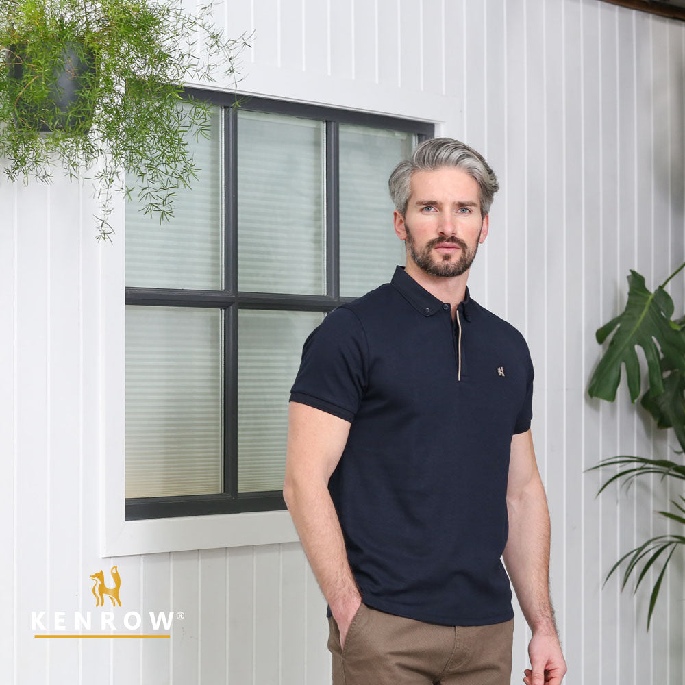 Kenrow Damien navy polo shirt worn by model, angled front view