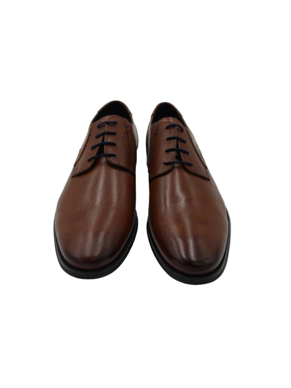 Pair of brown leather shoes on a white surface with a reflective background