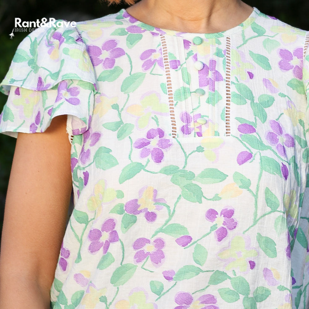 Rant & Rave Elna Top Cream, floral neckline detail on model