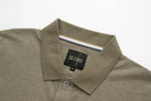 6th Sense Evoke Brindle Polo collar and inner neck label with stripe tape and size M tag.