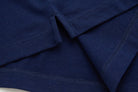 Fabric and stitched seams of the 6th Sense Evoke dress blue polo