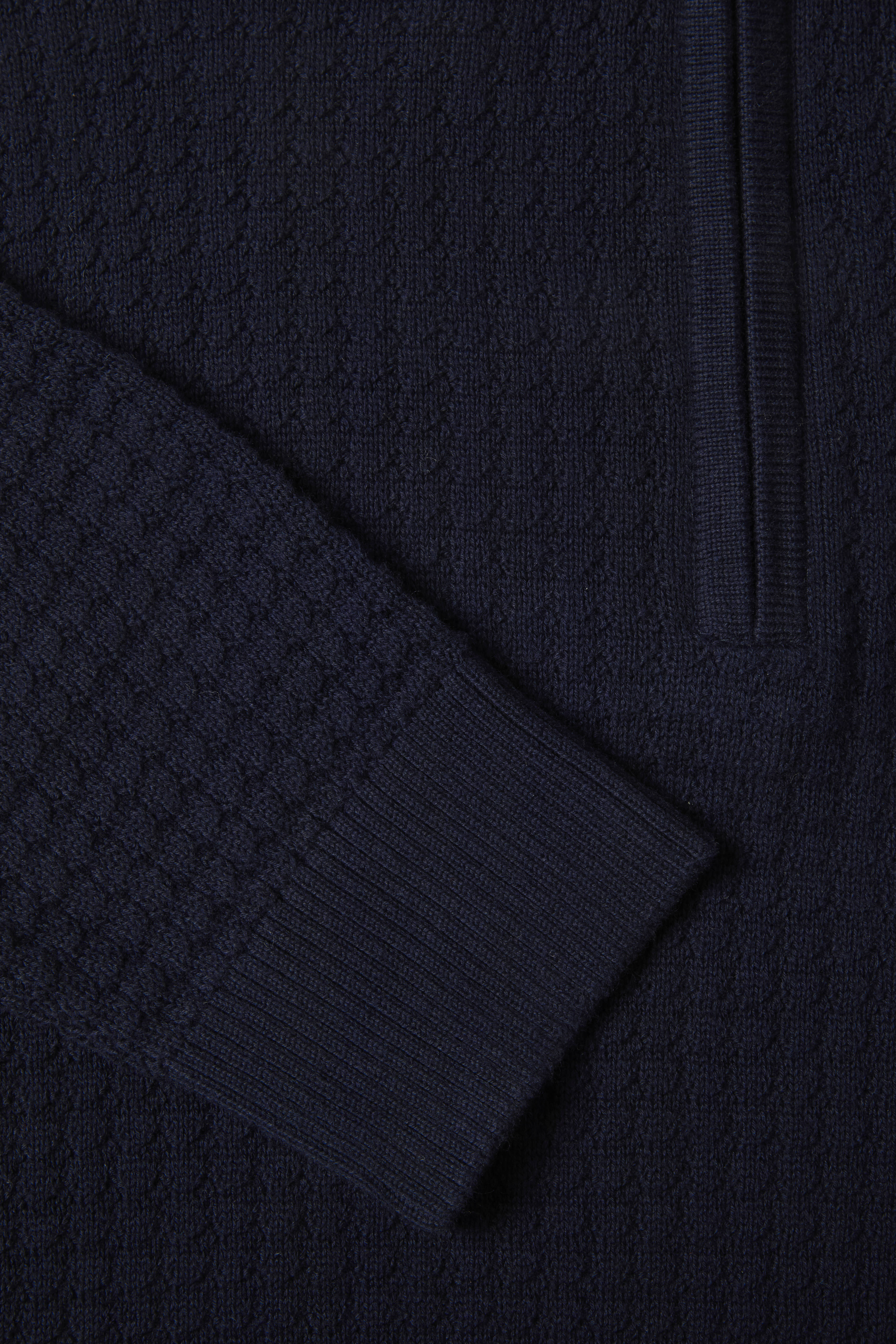 Close-up of a dark blue fabric texture