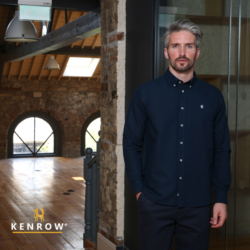 Man wearing a navy coloured shirt