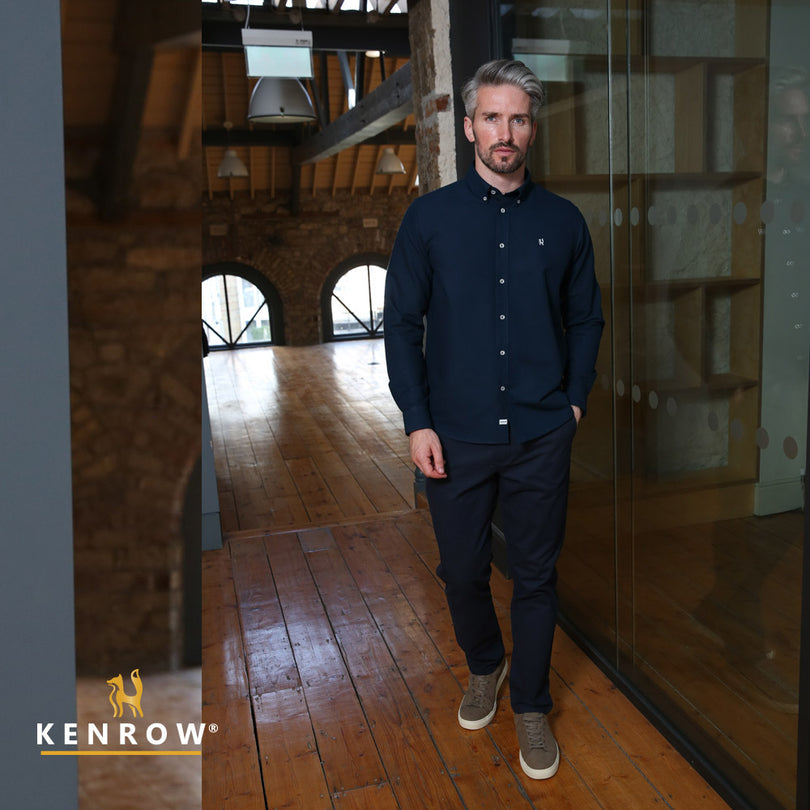 Man wearing a navy coloured shirt