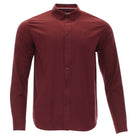 A long-sleeve button-down shirt in a deep burgundy red, featuring a classic pointed collar and a subtle embroidered logo on the left chest, displayed on a clean white background.