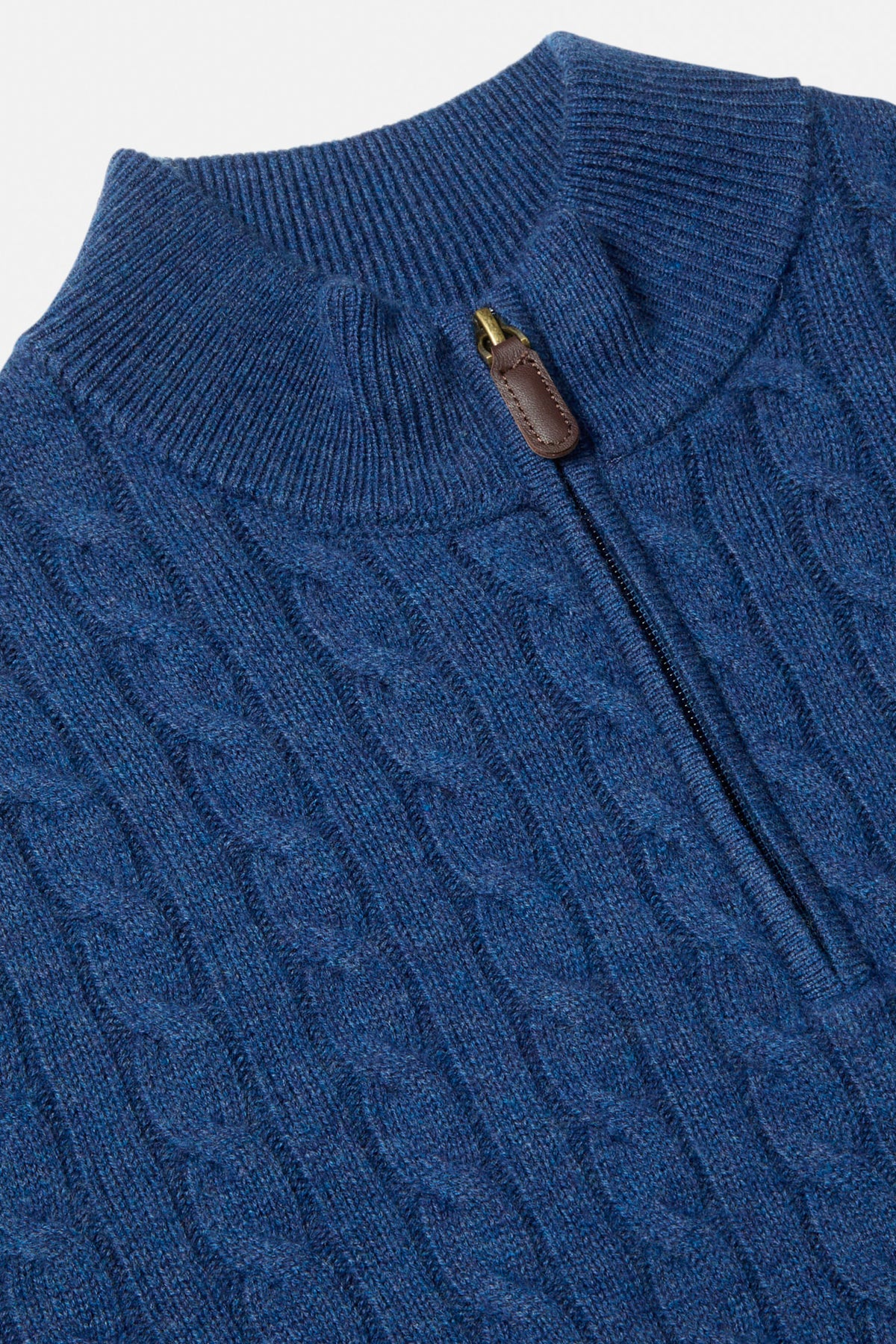 Close-up of Benetti Grant INDIGO 1/4 Zip knitwear with ribbed collar, quarter-zip and textured cable knit pattern.