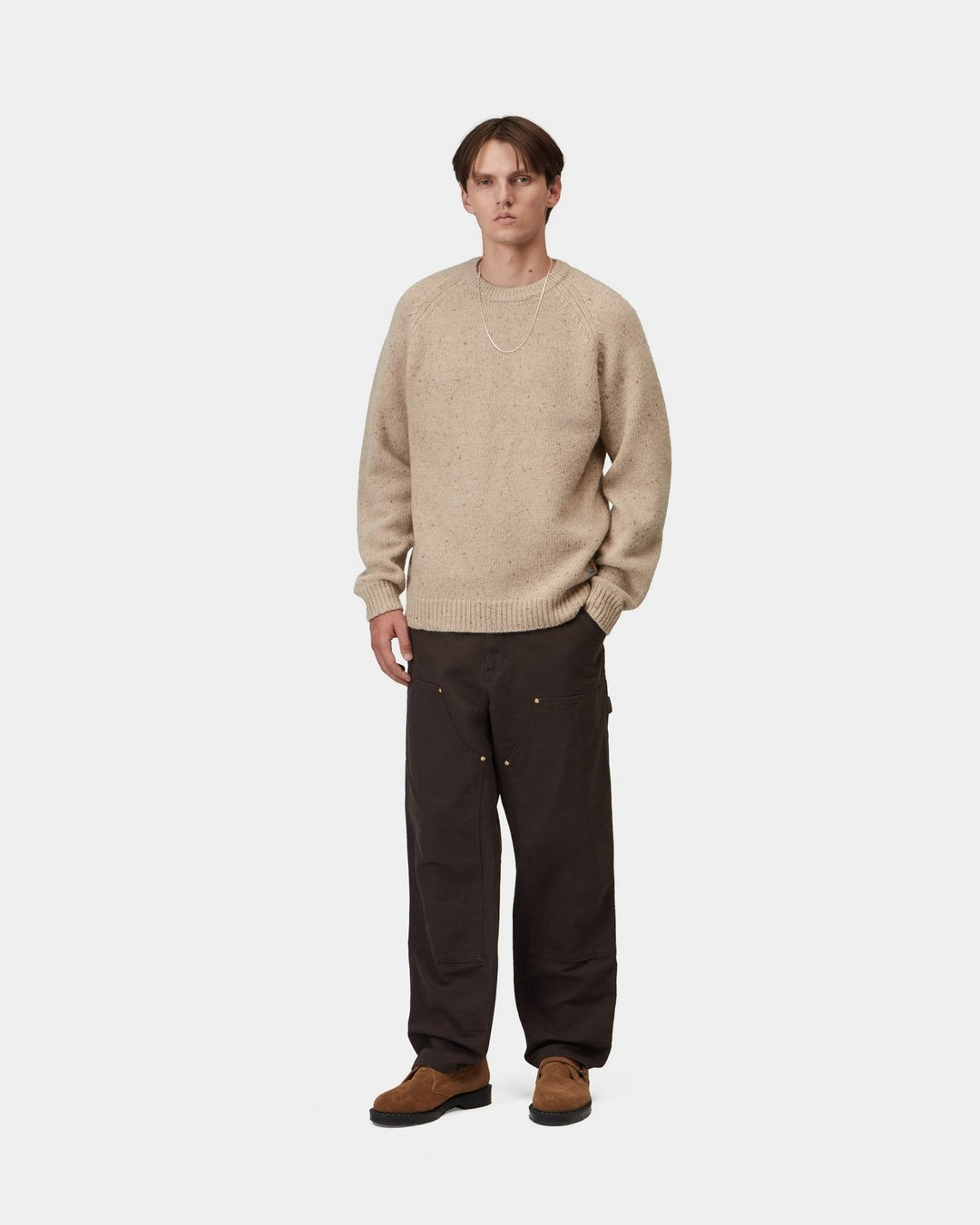 Carhartt WIP Anglistic Sweater in Speckled Fleur de Sel, shown worn by a model in a front view.