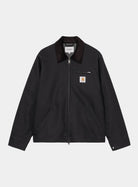 Carhartt WIP Detroit Jacket in Dark Navy / Black, front view with corduroy collar, zip chest pocket, logo patch, and zip closure.