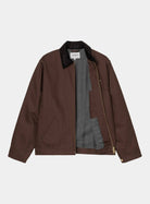 Carhartt WIP Detroit Jacket in Tobacco / Black, front view with corduroy collar, gold-tone zip, and grey blanket lining visible.