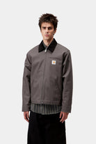 Side view of the Carhartt Detroit Jacket with black collar