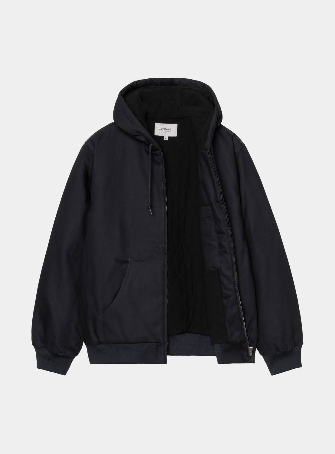 Carhartt WIP Active Jacket in Dark Navy, front view with the zip open to show the black insulated lining and interior pocket. The jacket has a drawstring hood, ribbed cuffs and hem, a front kangaroo pocket, and a white Carhartt WIP label at the inner neck.