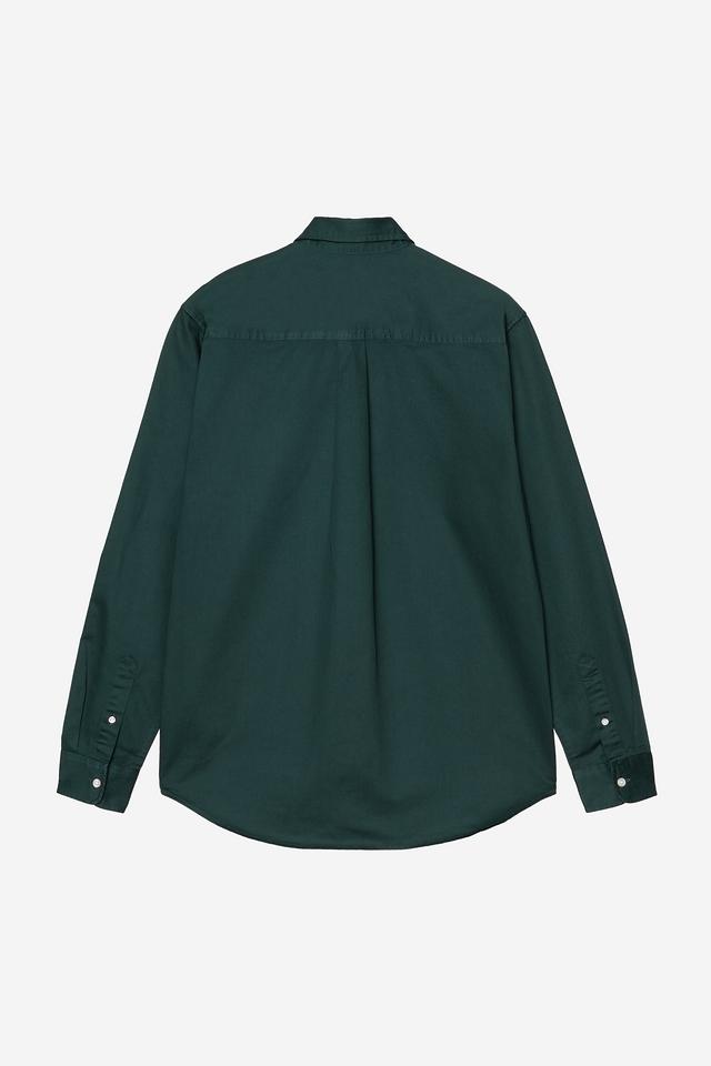 Green shirt on a light gray background