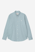 Light blue button-up shirt on a white background