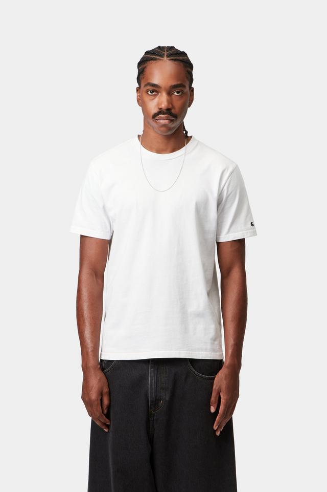 Man wearing short sleeve Base T-Shirt in white with black logo on the sleeve