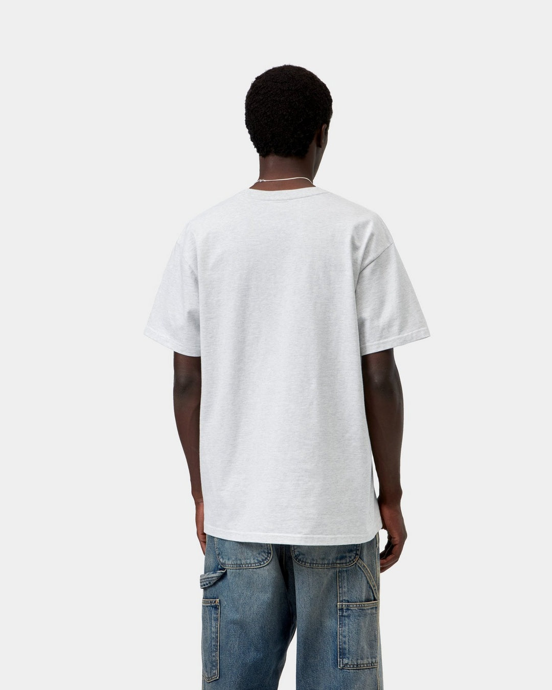Back view of a Carhartt WIP S/S Chase T-Shirt in Ash Heather / Gold, worn with loose fit and short sleeves.