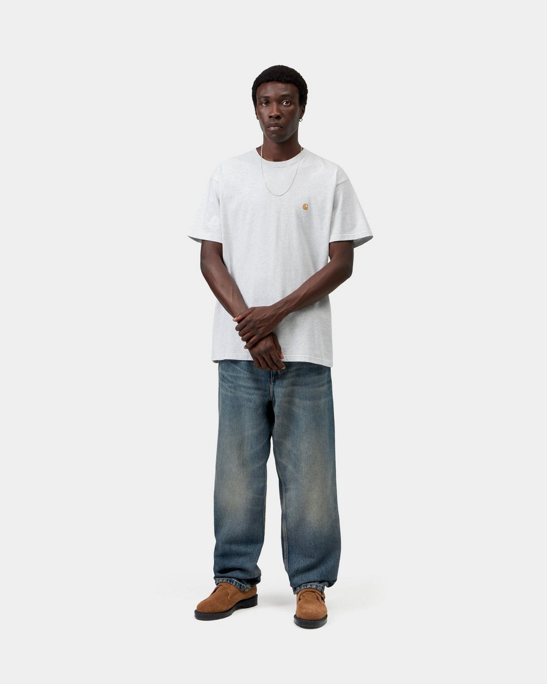 Carhartt WIP S/S Chase T-Shirt in Ash Heather / Gold, front view, worn with small embroidered chest logo.