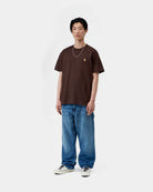 Carhartt WIP S/S Chase T-Shirt in Palisander / Gold, worn by a model with a small embroidered chest logo.