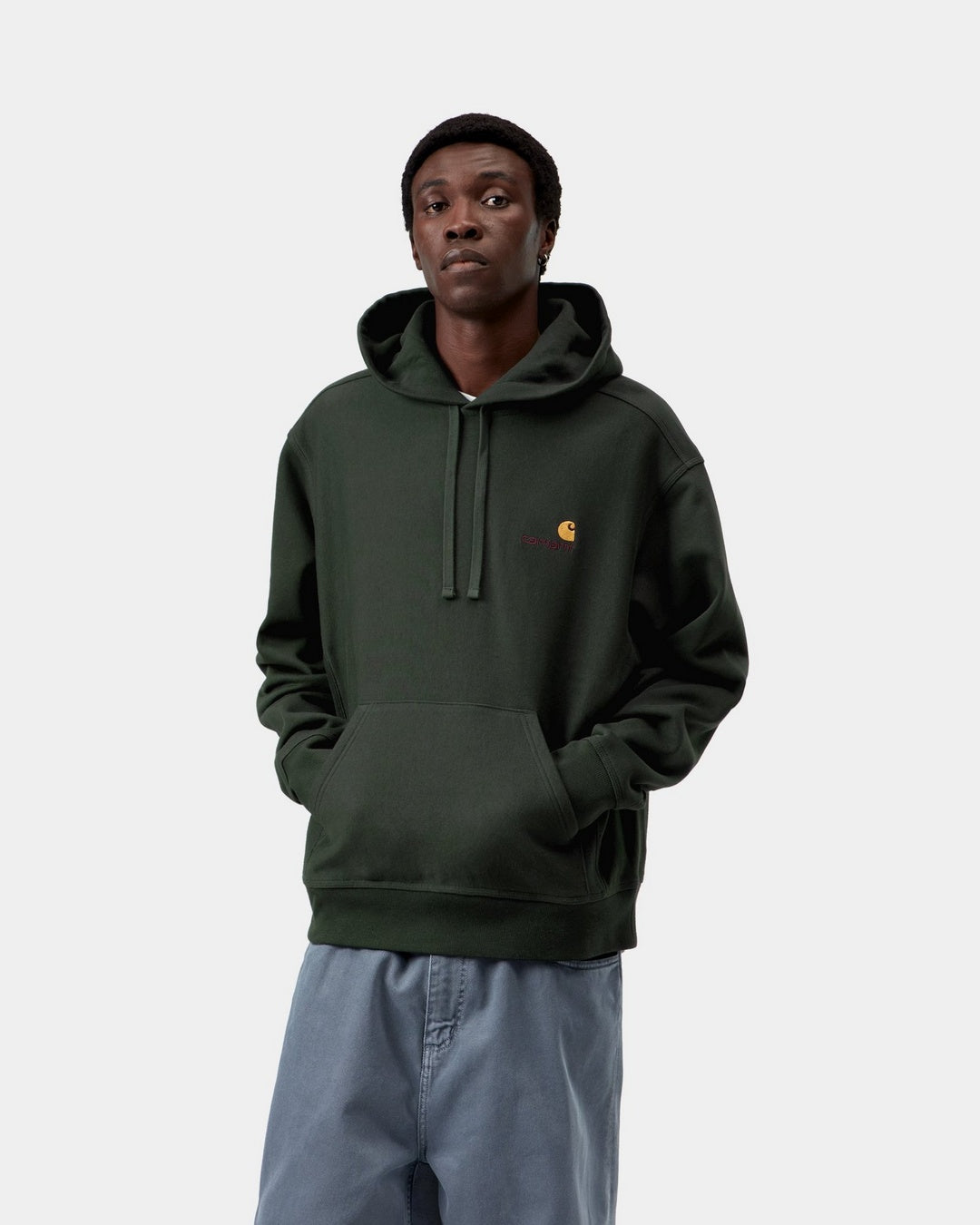 Carhartt WIP Hooded American Script Sweatshirt in Raven, front view, with kangaroo pocket and logo chest embroidery, shown on model.
