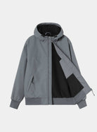 Carhartt WIP Hooded Sail Jacket in Styx / White, front view with the zip partially open to show the black fleece lining. The jacket has an adjustable hood, a zipped side pocket, rib-knit cuffs and hem, and a woven Carhartt WIP label at the hood.