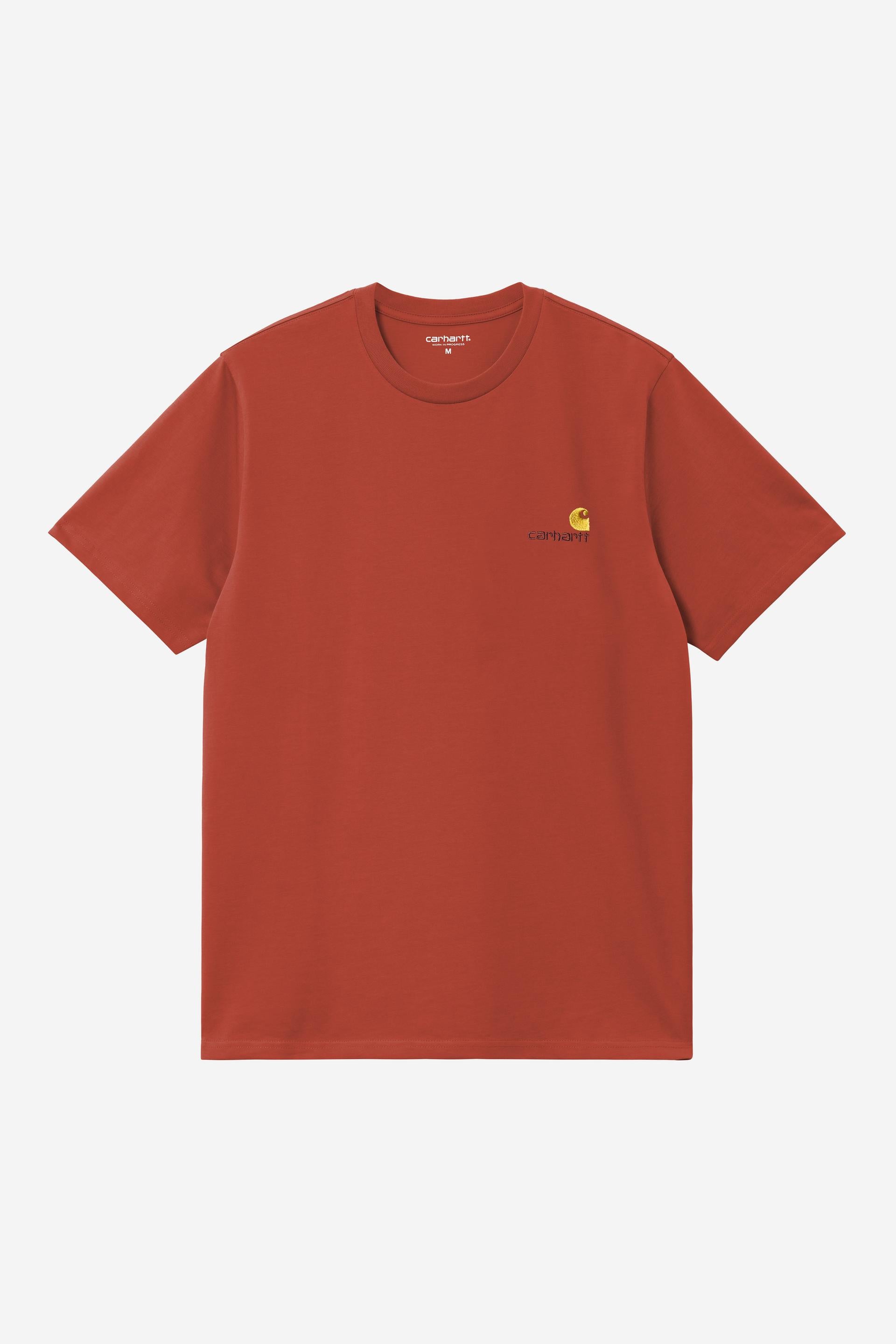 Red t-shirt with a small logo on a light gray background