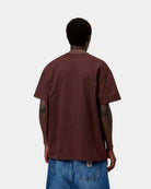 Carhartt WIP S/S American Script T-Shirt in Amarone, back view, worn with blue jeans.