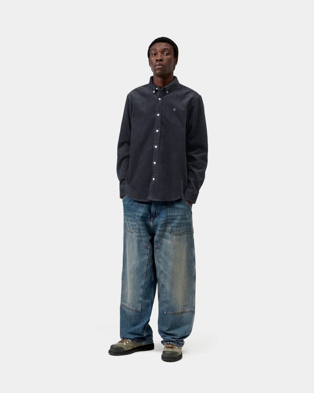 Carhartt WIP Madison Cord Shirt in Dark Navy front view on model