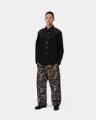 Carhartt WIP L/S Madison Cord Shirt in Soot, worn by model in a front view
