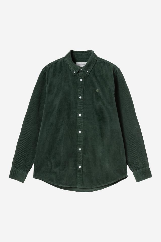 Green corduroy shirt on a light gray background