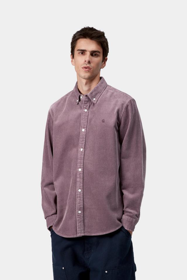 Man wearing a purple button-up shirt against a white background