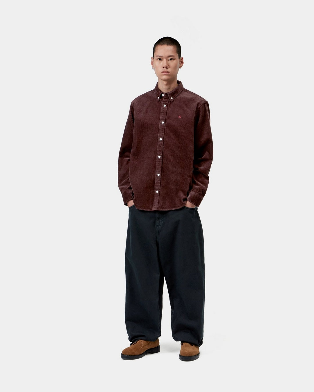 Carhartt WIP L/S Madison Cord Shirt in Amarone, front view, worn by model with button-down collar and chest logo embroidery visible.