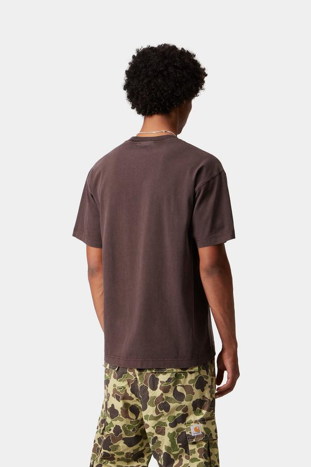 Person wearing a brown t-shirt and camouflage pants on a white background
