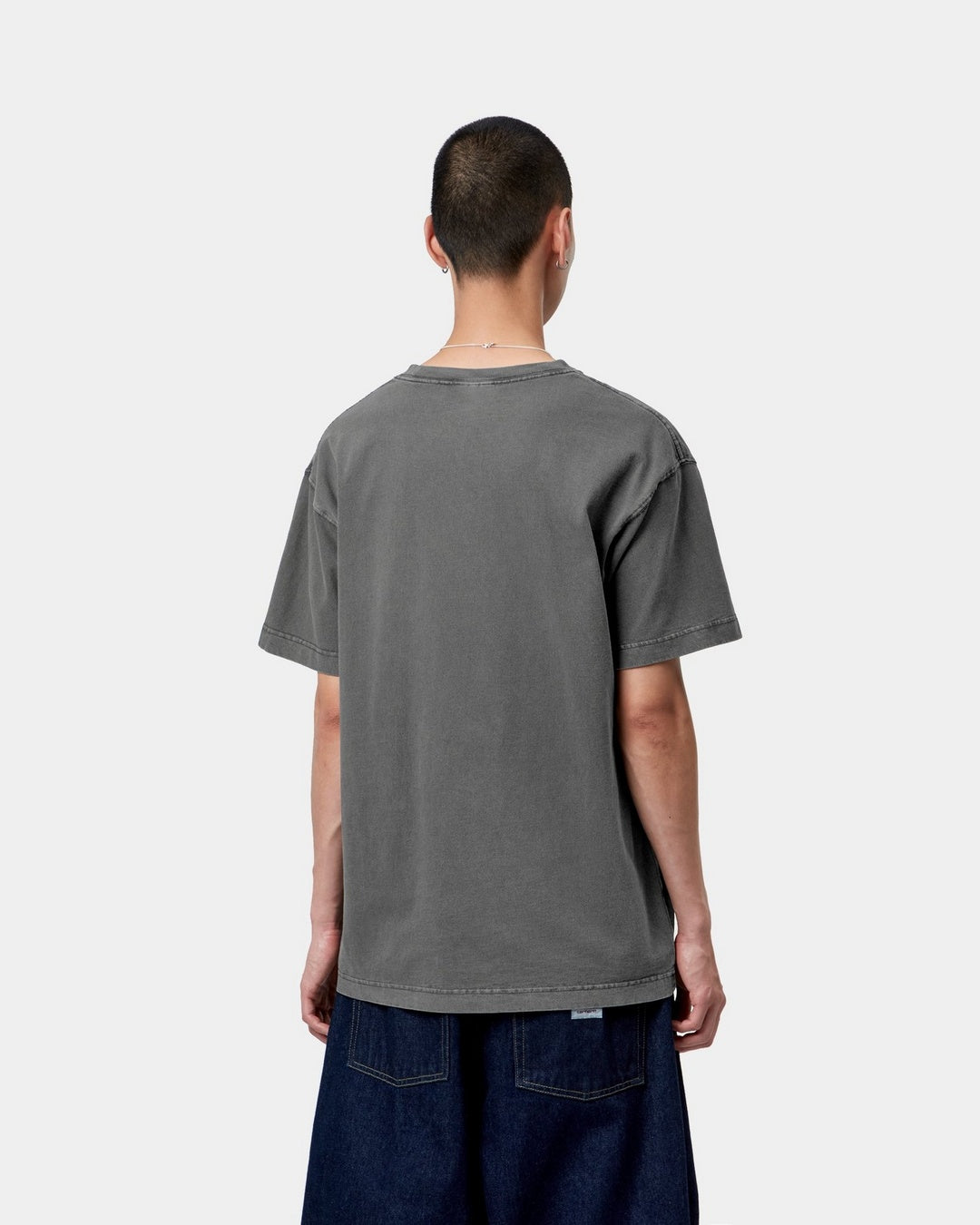 Carhartt WIP S/S Vista T-Shirt in Black, back view, with loose fit and short sleeves, shown on model.
