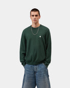 Carhartt WIP Madison Sweater in Dark Scarab / Wax, front view, with a ribbed crew neck and small chest logo, shown on model.