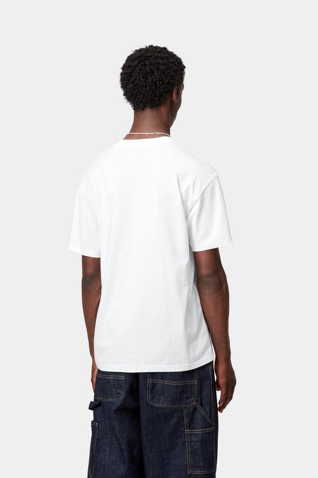 Person wearing a plain white t-shirt and dark pants on a white background