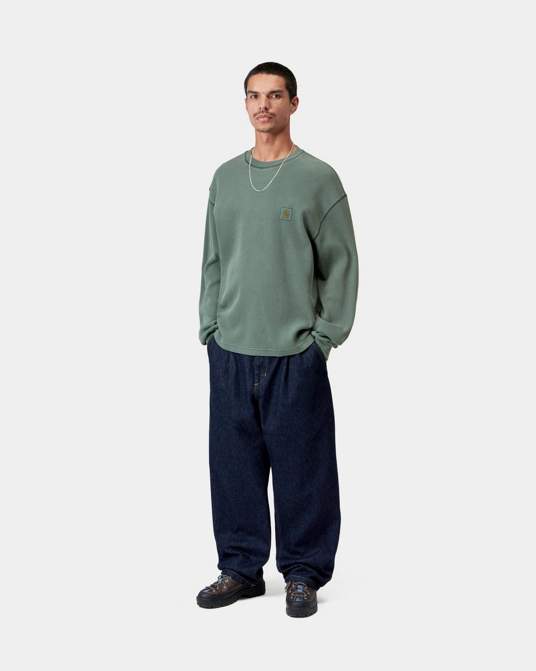 Carhartt WIP L/S Vista Waffle T-Shirt in Dark Scarab, front view, worn with woven Square Label on chest.