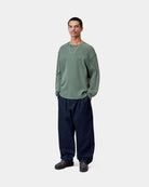 Carhartt WIP L/S Vista Waffle T-Shirt in Dark Scarab, front view, worn with woven Square Label on chest.