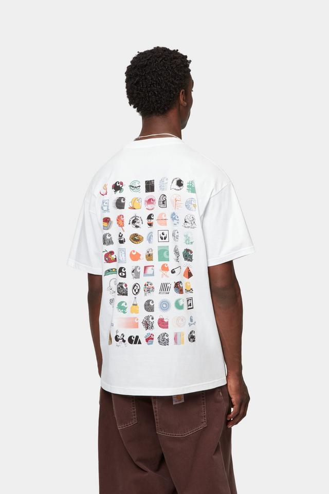 Person wearing a white t-shirt with colorful graphics on the back, standing against a white background
