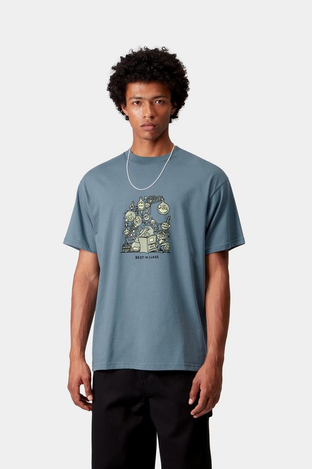 Person wearing a blue t-shirt with a graphic design on a white background