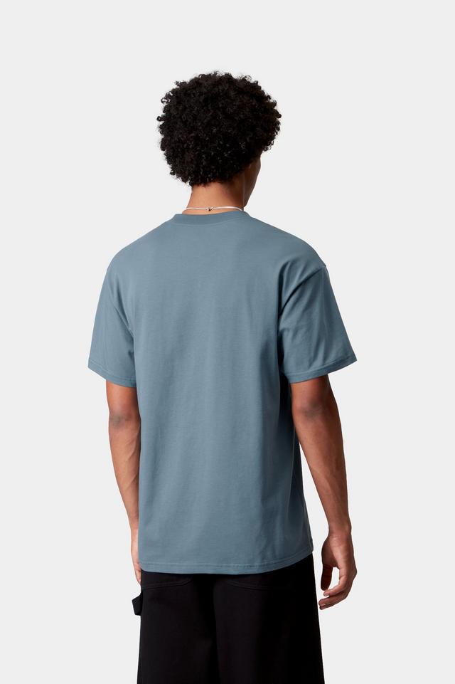 Person wearing a light blue t-shirt on a white background
