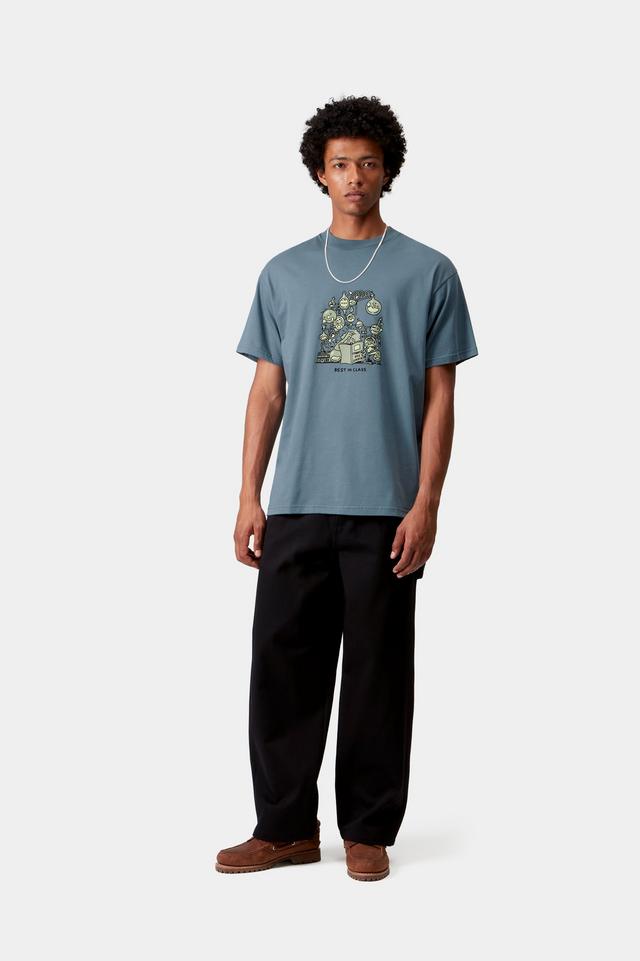 Person wearing a blue t-shirt with a graphic design on a white background
