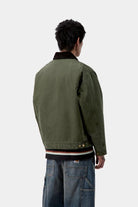 Carhartt WIP OG Detroit Jacket-Olive / Black Olive / Black model front view