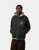 Carhartt WIP Prentis Liner in Raven / Black, front view, with a zip chest pocket and logo patch, shown on model.