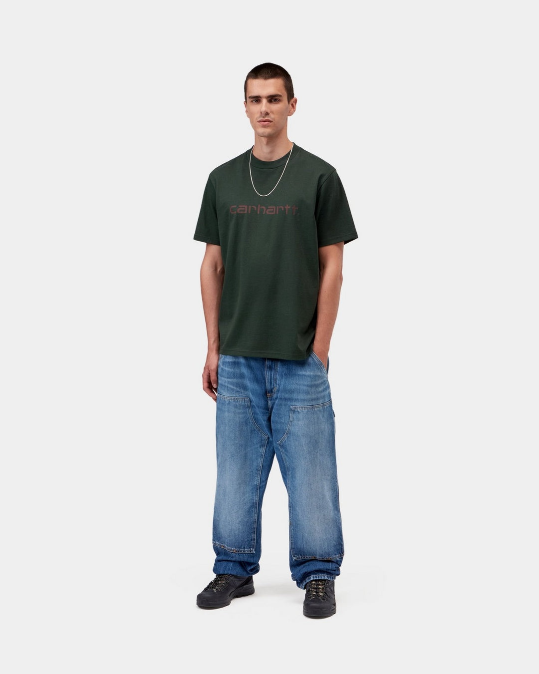 Carhartt WIP S/S Script T-Shirt in Dark Scarab / Palisander, front view, worn with script logo on chest