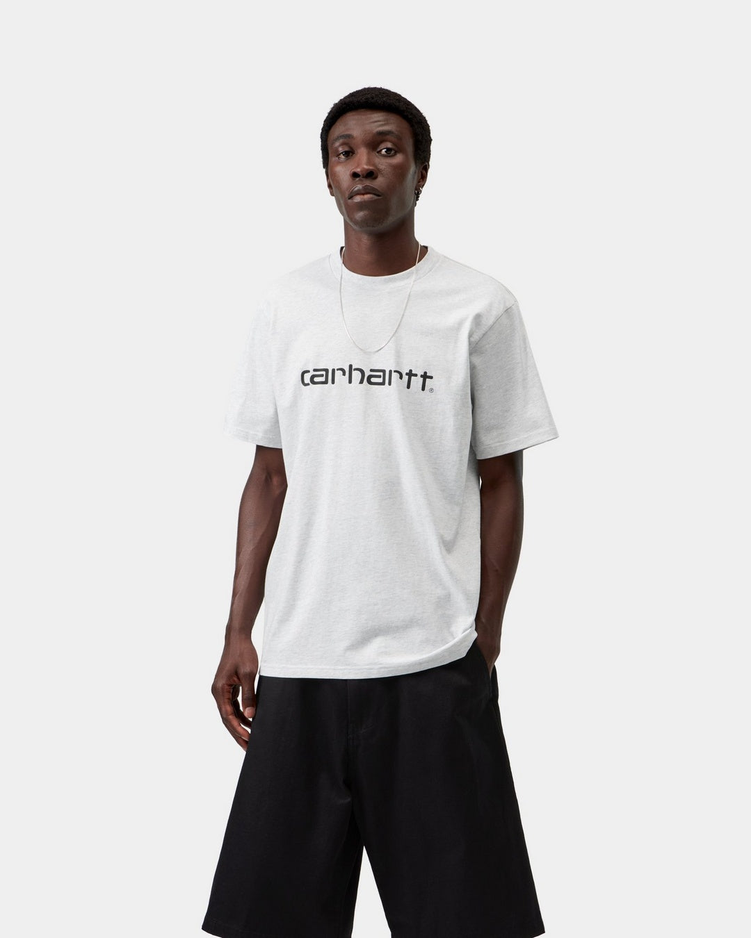 Carhartt WIP S/S Script T-Shirt in Ash Heather / Graphite, front view, with Carhartt logo print on the chest, shown on model.